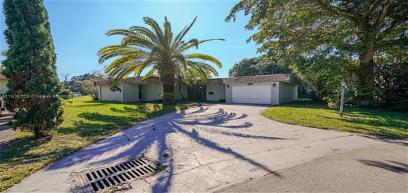 5704 White Hickory Cir Tamarac Florida, 33319 | Spectacular Single Family Home