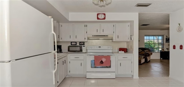 6522 Coliseum BOULEVARD Port Charlotte Florida, 33981 | Exclusive Home in Gardens of Gulf Cove