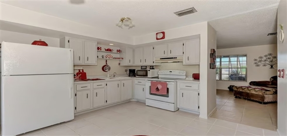6522 Coliseum BOULEVARD Port Charlotte Florida, 33981 | Exclusive Home in Gardens of Gulf Cove