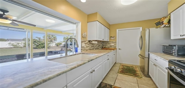 6543 Coliseum BOULEVARD Port Charlotte Florida, 33981 | RARELY AVAILABLE TWO CAR GARAGE Single Family Home