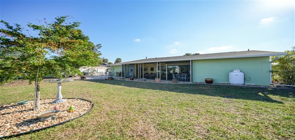 6543 Coliseum BOULEVARD Port Charlotte Florida, 33981 | RARELY AVAILABLE TWO CAR GARAGE Single Family Home