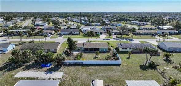 6543 Coliseum BOULEVARD Port Charlotte Florida, 33981 | RARELY AVAILABLE TWO CAR GARAGE Single Family Home