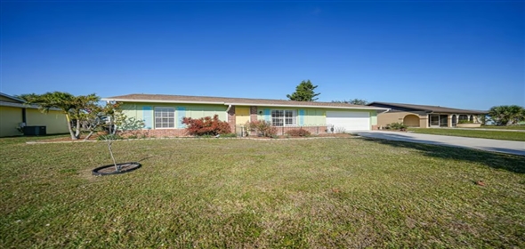 6543 Coliseum BOULEVARD Port Charlotte Florida, 33981 | RARELY AVAILABLE TWO CAR GARAGE Single Family Home