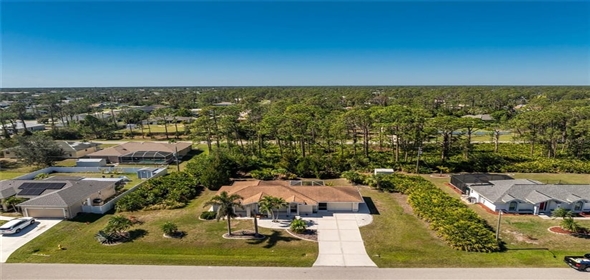 5441 Farley STREET Port Charlotte Florida, 33981 | Expansive Gulf Cove Home on Double Lot