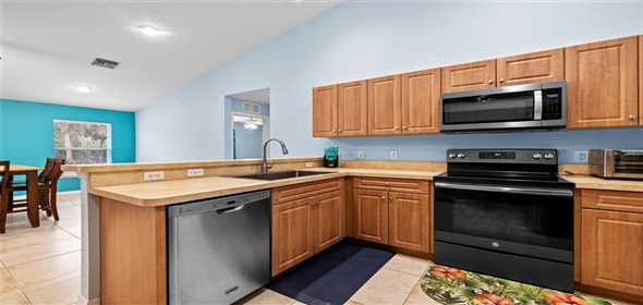 6131 Tedder STREET Port Charlotte Florida, 33981 | Exclusive Open Floor Plan House