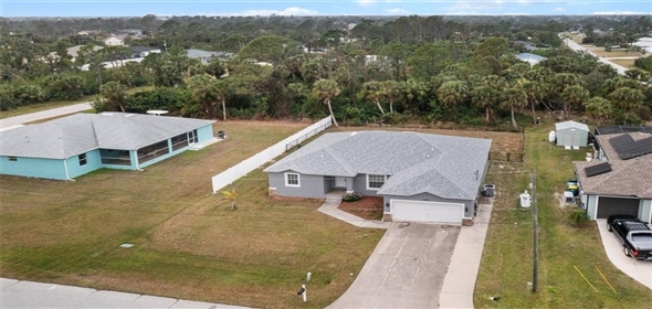 6131 Tedder STREET Port Charlotte Florida, 33981 | Exclusive Open Floor Plan House