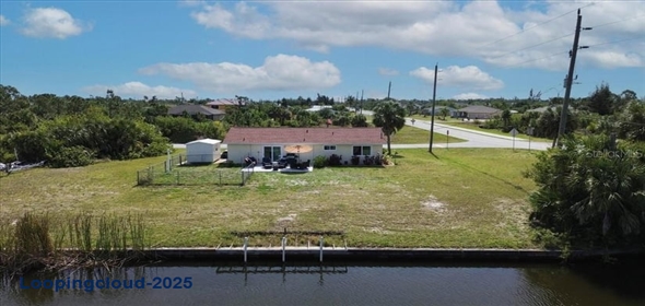 9150 ARRID CIRCLE Port Charlotte Florida, 33981 | Canal Front Home