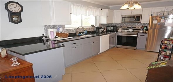 6249 DRUCKER CIRCLE Port Charlotte Florida, 33981 | Delightful One Story Home