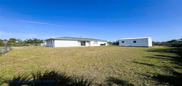 12143 DU BARRY AVENUE Port Charlotte Florida, 33981 | Beautiful Home in a Corner  Lot