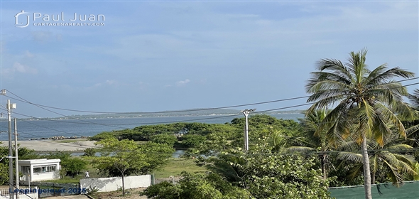 Corner of 4th Street and 5th Avenue.  Bolivar, 130001 | Stylish Two-Story Apartment in Bocagrande with Panoramic Ocean Views and Dual Balconies