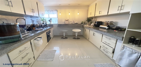 Corner of 4th Street and 5th Avenue.  Bolivar, 130001 | Stylish Two-Story Apartment in Bocagrande with Panoramic Ocean Views and Dual Balconies