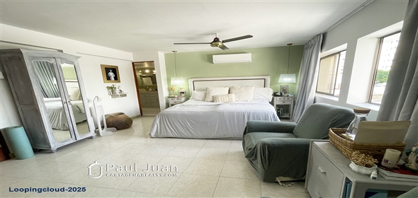 Corner of 4th Street and 5th Avenue.  Bolivar, 130001 | Stylish Two-Story Apartment in Bocagrande with Panoramic Ocean Views and Dual Balconies