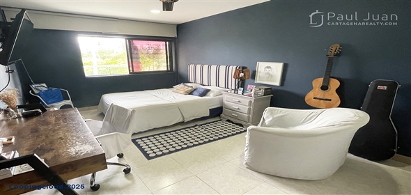 Corner of 4th Street and 5th Avenue.  Bolivar, 130001 | Stylish Two-Story Apartment in Bocagrande with Panoramic Ocean Views and Dual Balconies