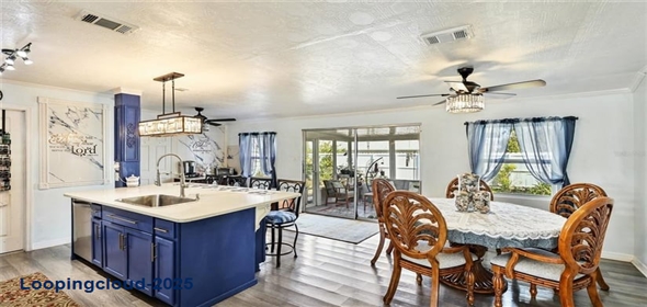 Address 13492 Dibella Avenue Port Charlotte Florida, 33981 | Remodeled Single Family Home with Backyard Oasis & Solar Power in Gardens of Gulf Cove!