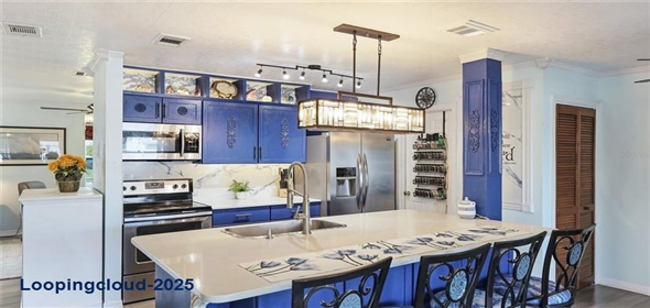 Address 13492 Dibella Avenue Port Charlotte Florida, 33981 | Remodeled Single Family Home with Backyard Oasis & Solar Power in Gardens of Gulf Cove!