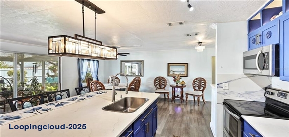 Address 13492 Dibella Avenue Port Charlotte Florida, 33981 | Remodeled Single Family Home with Backyard Oasis & Solar Power in Gardens of Gulf Cove!