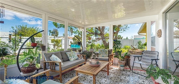 Address 13492 Dibella Avenue Port Charlotte Florida, 33981 | Remodeled Single Family Home with Backyard Oasis & Solar Power in Gardens of Gulf Cove!