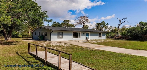 6329 David Boulevard Port Charlotte Florida, 33981 | Charming 3-Bedroom Single Family Home in Gulf Cove with Screened Patio & Optional River Access