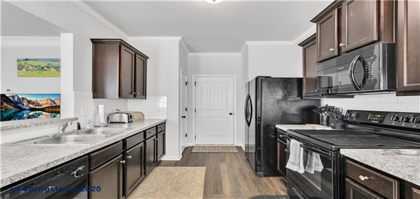 265 Valley Crossing Canton Georgia, 30114 | Charming Craftsman-Style Townhome with Resort-Style Amenities
