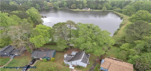 1077 Mainstreet Valley Drive Stone Mountain Georgia, 30088 | Charming Lakeside Single family Home with Peaceful Views