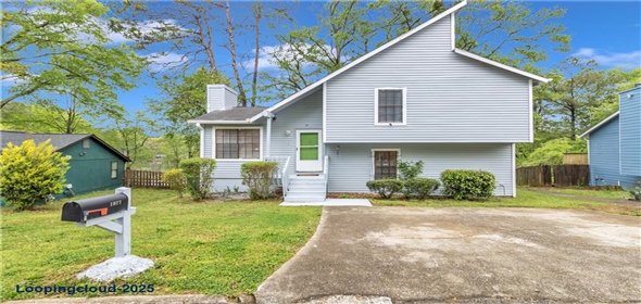 1077 Mainstreet Valley Drive Stone Mountain Georgia, 30088 | Charming Lakeside Single family Home with Peaceful Views