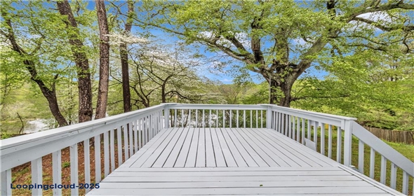 1077 Mainstreet Valley Drive Stone Mountain Georgia, 30088 | Charming Lakeside Single family Home with Peaceful Views