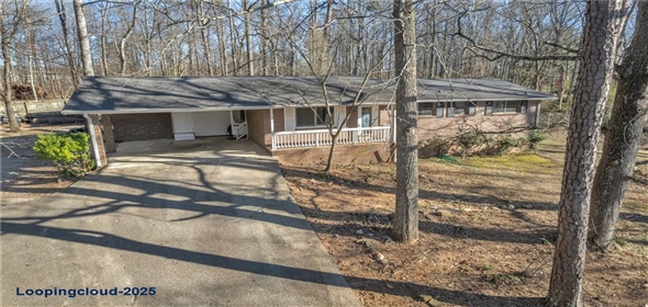 6198 Rocky Creek Drive Douglasville Georgia, 30135 | Spacious Single-Family Home with Sunroom & Workshop