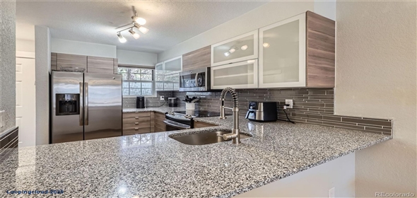 1818 S Quebec Way #11-8 Denver Colorado, 80231 | Exclusive Townhouse