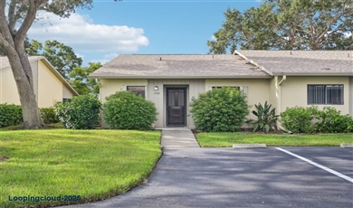  Charming End-Unit Condominium