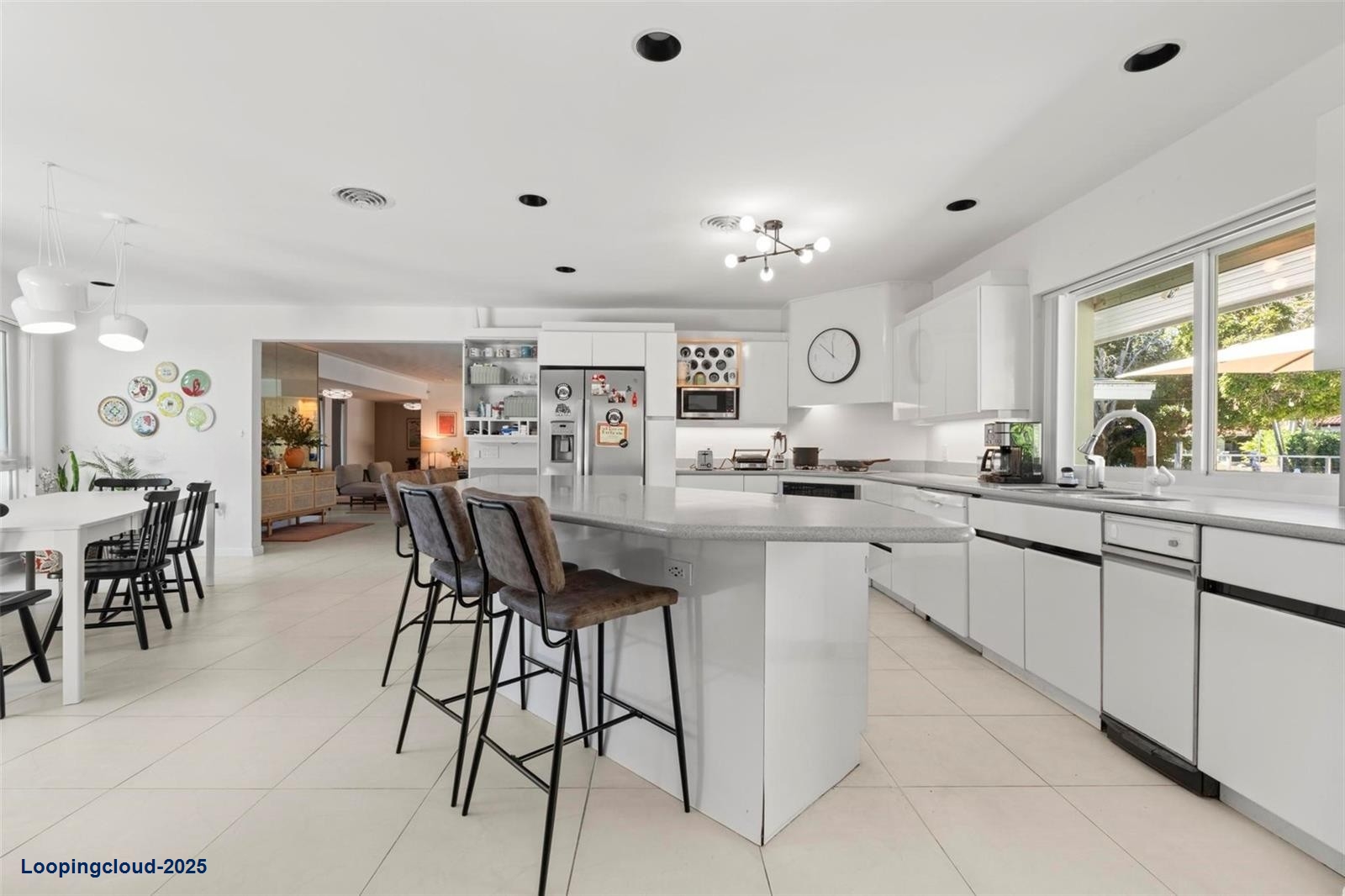 Elegant Waterfront Home with 90-ft Dock in Gables by the Sea