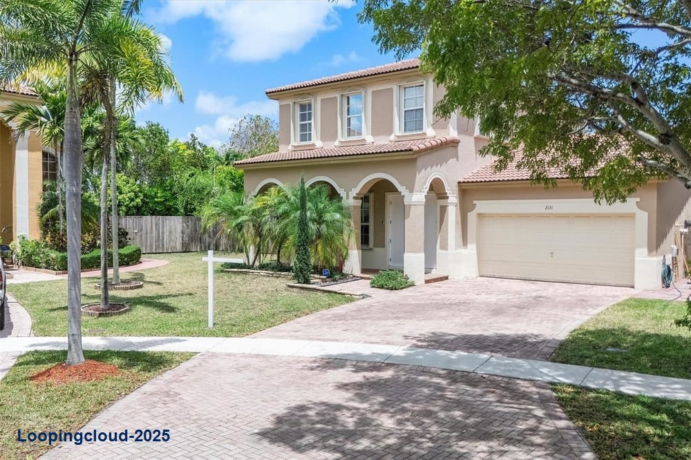 Experience Floridian Bay: Renovated Home on Oversized Waterfront Lot