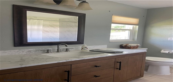 48 DADE AVENUE Sarasota Florida, 34232 | Updated Concrete Block Ranch Style Home