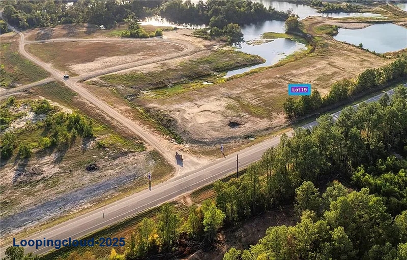 Oversized Lot with Hwy-16 Frontage & River Access