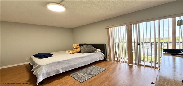 8550 N Sherman Cir # 507 Miramar Florida, 33025 | Top-Floor 2BD/2BA Condo with Lake Views in Gated Lakeshore Community