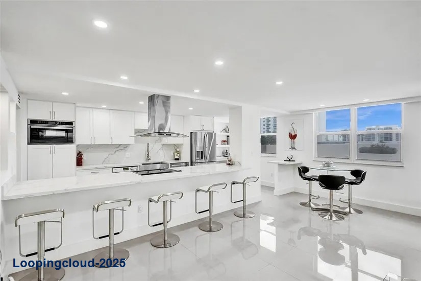 Villa-Style Luxury Condo at Aquarius – Walk-In Corner Unit with Sunset Deck Access