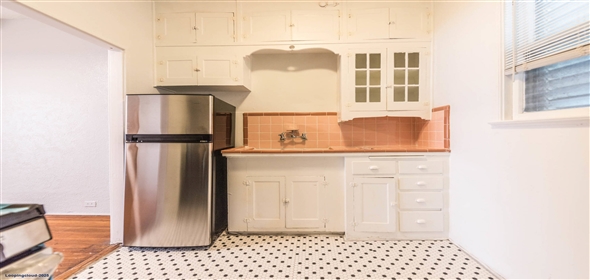 329 WEST HUISACHE AVENUE Olmos Park Texas, 78212 | Charming 12-unit Apartment Building