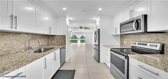 701 SW 142nd Ave #414S Pembroke Pines Florida, 33027 | Spacious 2-Bed/2-Bath Corner Condo with Enclosed Balcony Views