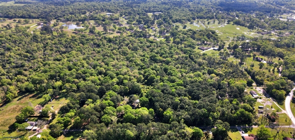 938 Minglewood Rd Liberty Texas, 77575 | +/-420 Acre Golf Course Fronting Land Dev Opp- Golf Course