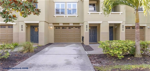 8614 MAJESTIC ELM CT Bradenton Florida, 34202 | Modern 3-Story Townhome with Pond Views & Designer Upgrades