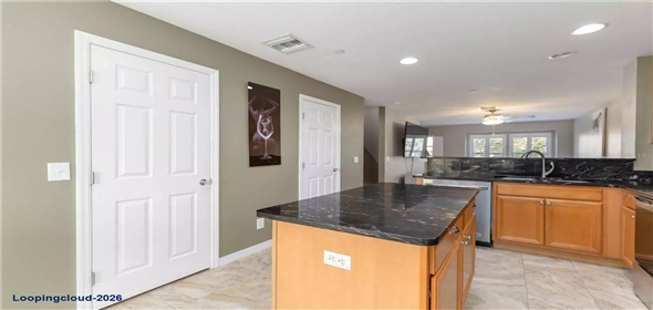 8614 MAJESTIC ELM CT Bradenton Florida, 34202 | Modern 3-Story Townhome with Pond Views & Designer Upgrades