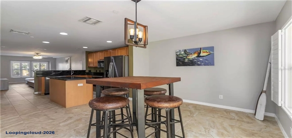 8614 MAJESTIC ELM CT Bradenton Florida, 34202 | Modern 3-Story Townhome with Pond Views & Designer Upgrades