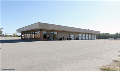 High-Yield Auto Repair & Tire Shop w/ Real Estate For Sale | Sanford, NC ($2.4M | 9.38% Cap Rate)